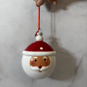 Adorno de navidad, Bola navideña cara de papá Noel.