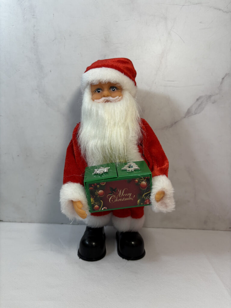 Adorno de navidad, papá Noel con caja de regalo.